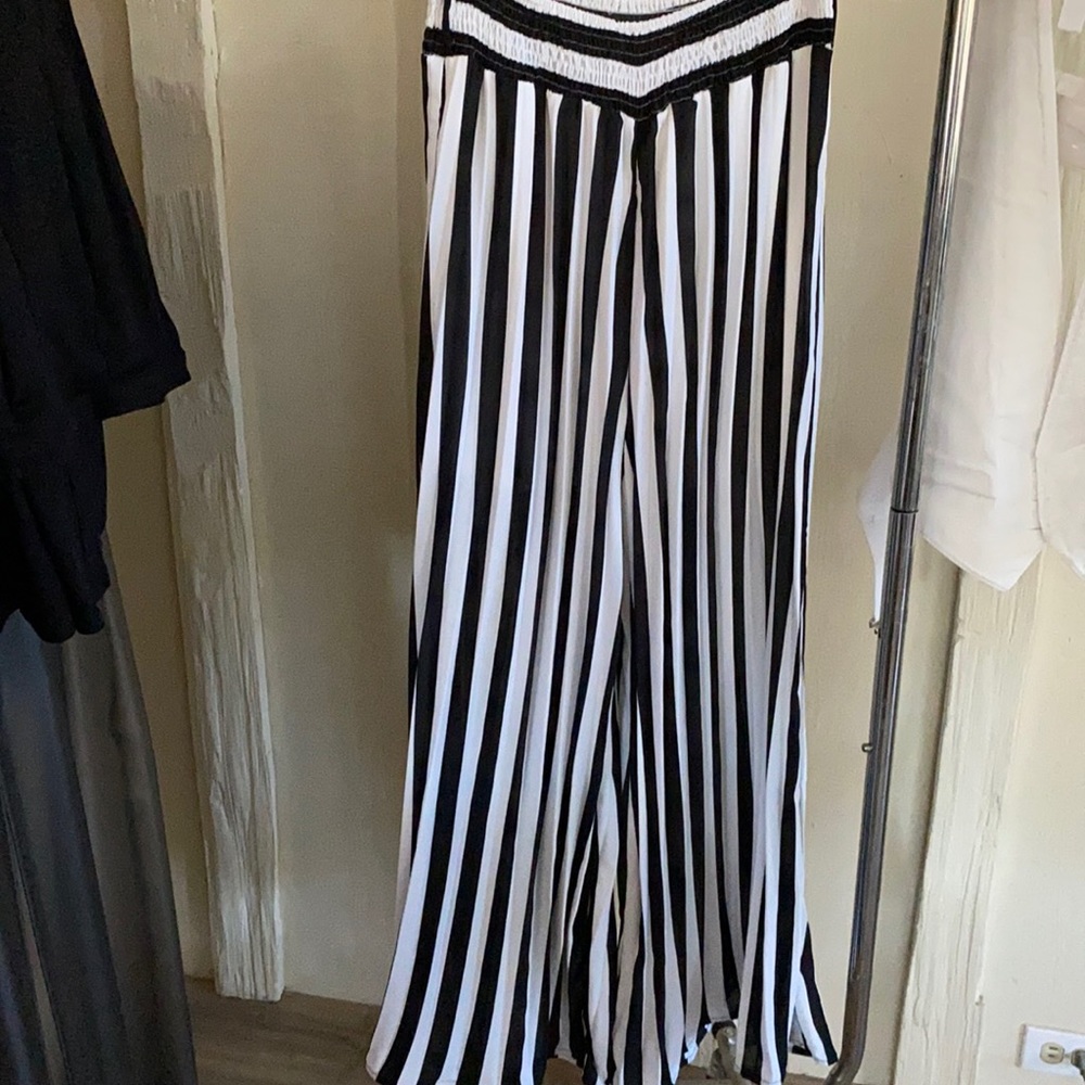 Striped palazzo pant with a soft crease.  Elastic waistband.